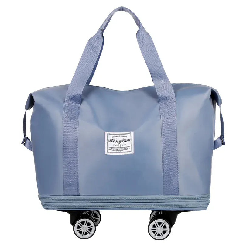 Le sac des voyageurs bleu Sac de Voyage Extensible a Roulettes