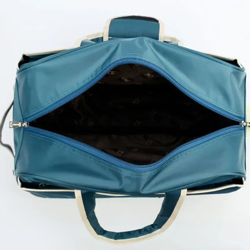 Le sac des voyageurs Petite Valise a Roulettes