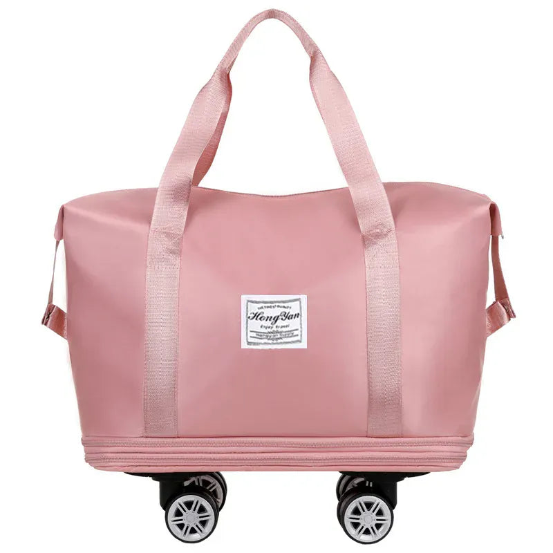 Le sac des voyageurs rose Sac de Voyage Extensible a Roulettes